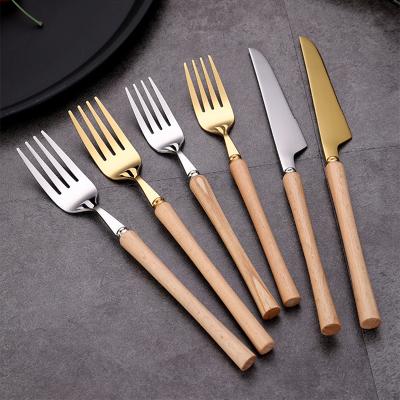 China High quality new hotsale 18-10 disposable handle wooden cutlery set for hotel and wedding for sale