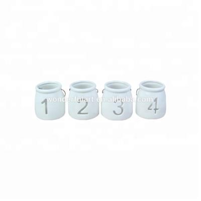 China Home Unique Number Pattern Decoration Ceramic Candle Lantern For Sale for sale