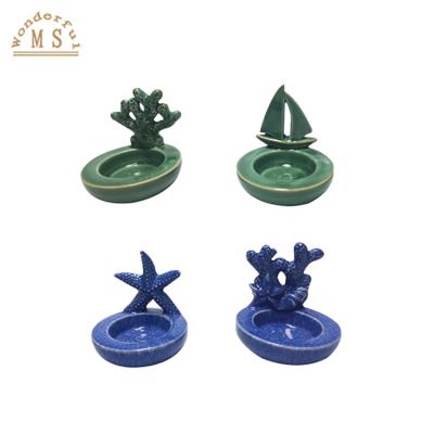 China Fashionable Ceramic Blue Holder Tea Light Candle Holder Ocean Style Home Decoration for sale