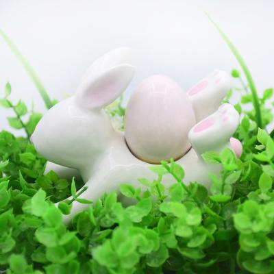 China Cute Eco-Friendly Happy Easter Dolomite Easter Bunny Egg White Rabbit Desktop Ornament Porcelain Figurine for Indoor Home Decoration for sale