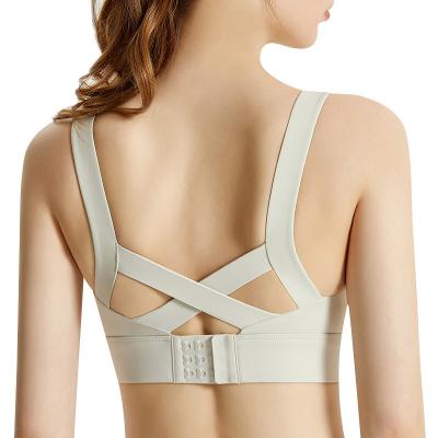 China Anti-Bacterial Yoga Strappy Gym Workout Sportsbra Top Plain Strong Shock Proof Padded Set Backless Sports Bra For Women for sale