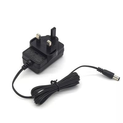 China ABS+PC Factory OEM UK Plug 12volt 1000mA kc Flame Retardant Material CMK Certified AC DC Power Adapter 12v 1a Adapter With Strip for sale