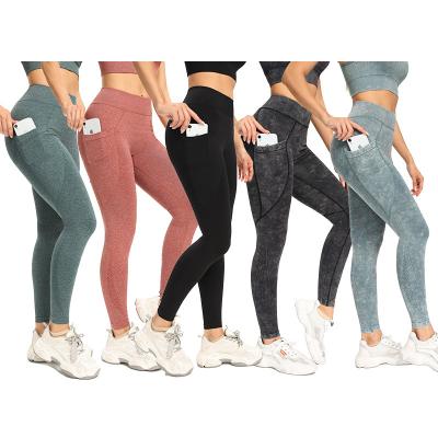 China 2022 Breathable Workout Sportswear Fitness Gym Clothing Yoga Pants Women High Waist Seamless Leggings With Pockets for sale