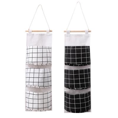 China Wholesale CLASSIC Cheap Hanging Storage Bag Door Hanging Pocket Organizer 3 Pockets School Dormitory Storage Bags For Students for sale