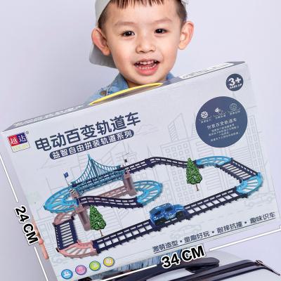 China Automatic Return Electric Rail Toy Car for Kids Dinosaur Astronaut Electric DIY Toys Educational Tracks and Bridges for sale