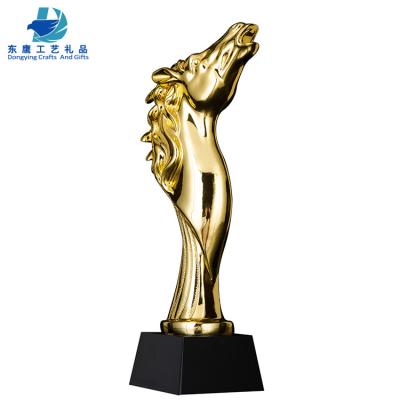 China China Newcomer Horse Train Crystal Golden Resin Trophy For Corporate Gift for sale