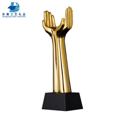 China China Personalized Custom Open Hand Crystal Resin Trophy Souvenir Award Trophy Gifts for sale