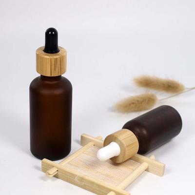 China New Design Cosmetic Essential Oil Tube Glass Dropper Luxury Bamboo Bottle 5ml 10ml 15ml 20ml 30ml 50ml 100ml for sale