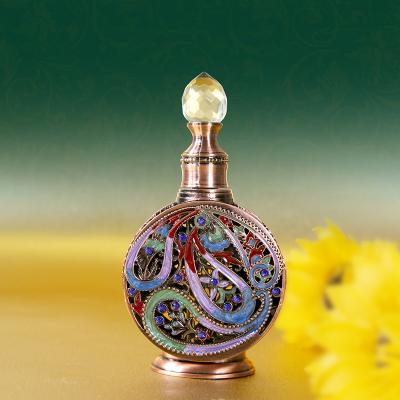 China Luxury Crystal Metal Beautiful Attar Perfume Essential Oil Bottle 10ml Fancy Arabic Style Dubai Cosmetics for sale