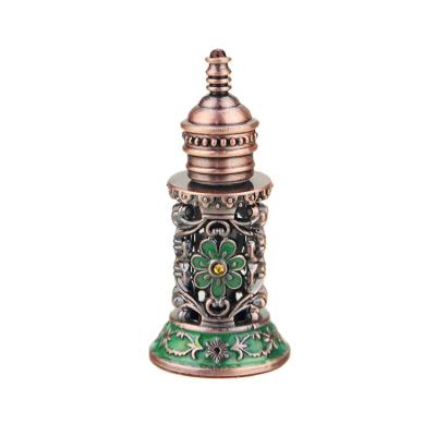 China Classic Antique Personal Care Essence Bottle Arabic Metal Essential Oil Bottle for sale