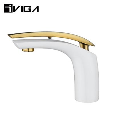 China Metered Bathroom Hot And Cold Water Basin Faucet Mixer Tap White And Brass Chrome Color Sink Faucet Faucets for sale