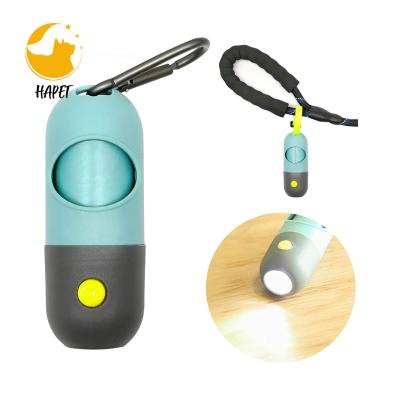 China LED Flashlight Dog Poop Bag Dispenser and Carabiner Tether Viable Built-in Dog Walking Accessory for sale