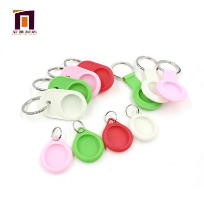 China Custom Colorful Portable Leather Key Chain Mini Tag Tracker Holder Case Protector Cover Wholesale Price for sale