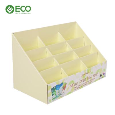 China Recyclable Custom Design Cardboard Display Rack Cosmetic Counter Make Up Skincare Display Stand for sale