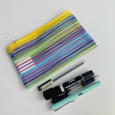 China Durable Design Rainbow Stripe Mesh Pencil Case Super Lightweight Stationary Zipper Pouch Now for sale