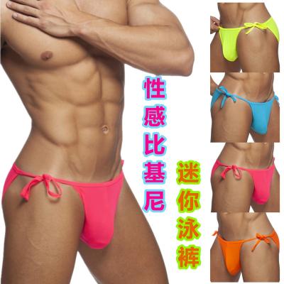 China Plus Size Mens Swimming Trunks Solid Color Adult Lanyard Sexy Beach Pants Bottoms Rise Bikini Swimming Trunks Men for sale