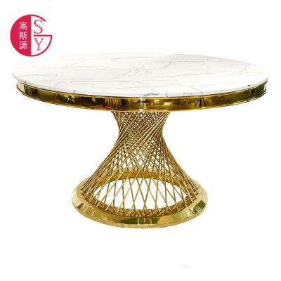 China Modern marble postmodern dining table restaurant stainless steel round table and chair combination household manufacturers wholesale for sale