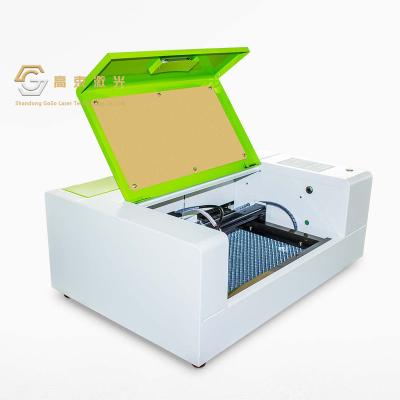 China Hot Selling 3020 Super High Quality Laser Cutting Machine High Quality Automated Loading Safety for sale