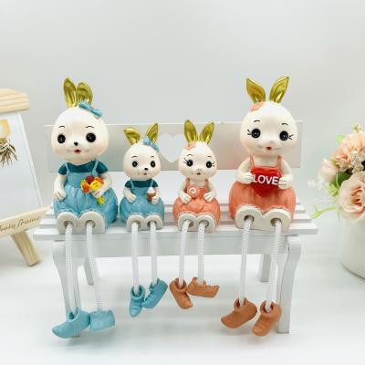 China Cute China Cartoon Resin Rabbit A Family Of Four Legs Rope Rabbit Couples Crafts Home Furnishings Gift Family for sale