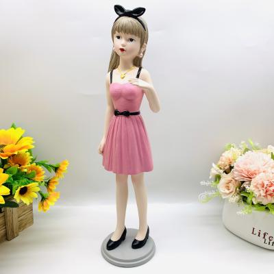 China China Creative Fashionable Pink Dress Bowknot Girl Resin Opens Home Furnishing Gift Souvenir for sale