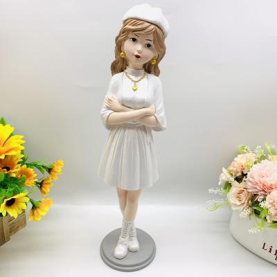 China Fashionable Creative China Wearing White Dress With Hat Angel Girl Resin Opens Home Furnishing Gift Souvenir for sale