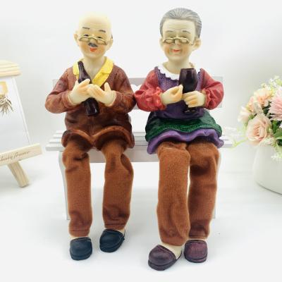 China Europe resin crafts extra large leg cloth old man entertainment leisure couples elderly furnishing articles the wedding gift for sale