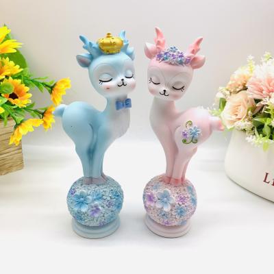 China China Hot Selling Cartoon Couples Deer Furnishing Articles Resin Crafts Step On Flower Ball Lovers Deer for sale