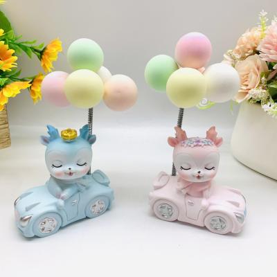 China China Hot Selling Cute Cartoon Couples Deer Furnishing Articles Resin Opens Confession Balloon Ride Car Deer for sale