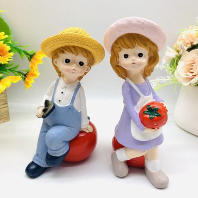 China Hot Selling China Fruit Lovers And Garden Lovers Furnishing Articles Resin Crafts Cartoon Love Couples Rural Ornaments for sale