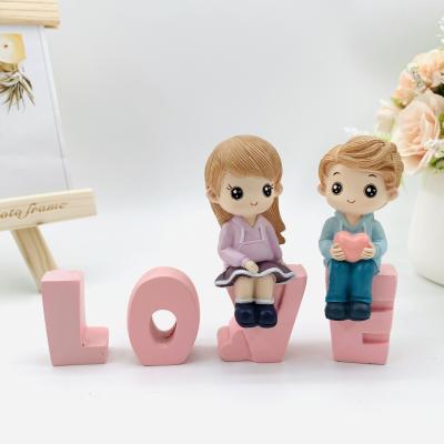 China China hot sale wedding gifts for guests furnishing articles resin crafts cartoon love couples cake ornaments and car ornaments for sale