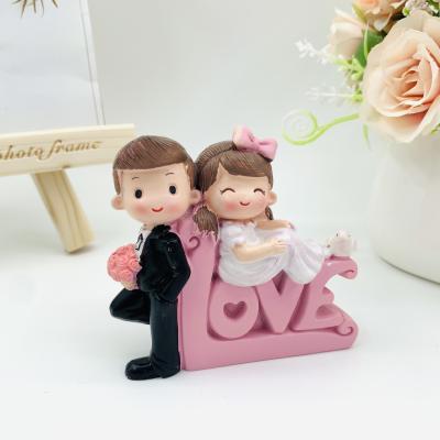 China China hot sale wedding gifts for guests furnishing articles resin crafts cartoon love couples cake ornaments and car ornaments for sale