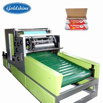 China Hotels 4 Spindles Fully Automatic Rewinding Machine For Kitchen Mate Aluminum Foil Roll for sale