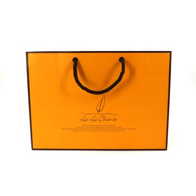 China Custom Luxury Cosmetic Shopping Gift Recycled Materials Logo Eco Friendly Recycled Packaging Paper Bags for sale