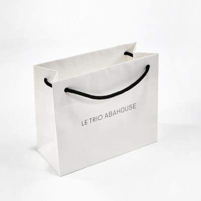 China Customized exclusive premium materials recycled paper bag paper bag paper gift competitive buying bags. for sale