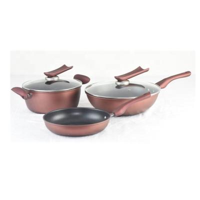 China 5 Pcs Non Sustainable Red Stick Forged Aluminum Cookware Set for sale