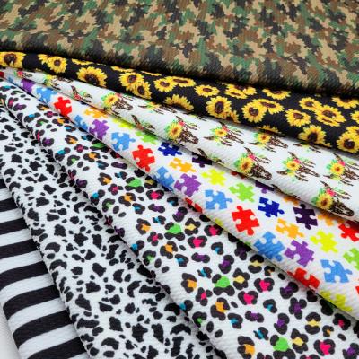 China Viable Low Price Customized Bullet Fabric Digital Printing Liverpool Knitted Polyester Fabric For Bow Leopard Design for sale