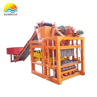 China Buliding Construction Interlock Block Casting Machine QTJ4-28 Concrete Automatic Brick Making Machine In Ghana Mozambique Zimbabwe for sale