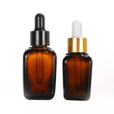 China 10ml 25ml 35ml Amber Personal Care Essential Oil Dropper Serum Liquid Glass Bottles With Cosmetic Dropper Package for sale