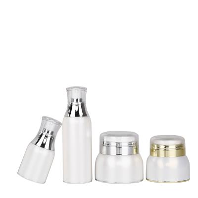 China New design simple cosmetic and multi-shape lotion bottle white vacuum pump packaging bottle cosmetic set for sale