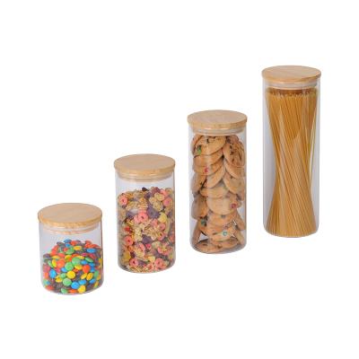 China Sustainable Eco Friendly Custom Single Color Glass Storage Bottles Jars With Bamboo Lid for sale