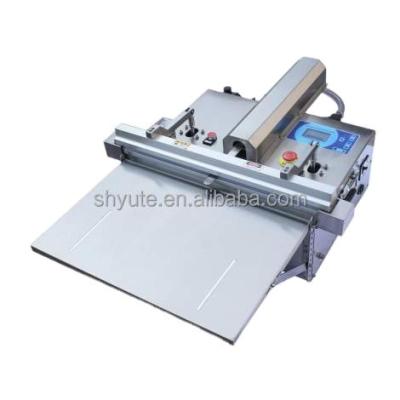 China CLOTHING Pump External Vacuum Ventilating Packing Machine With Nitrogen Flow for sale