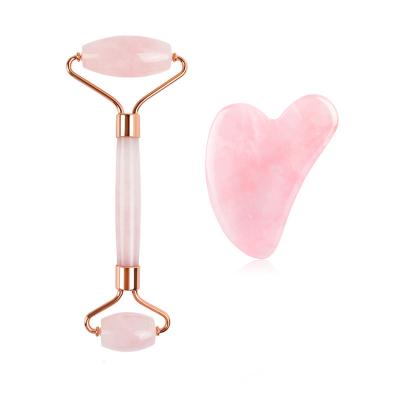 China 100% natural high quality face quartz jade roller and gua sha pink face jade roller for women for sale