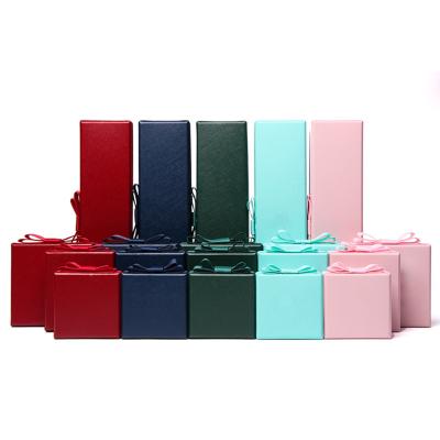 China Newest Materials Paper Jewelry Box Reused Luxury Jewelry Gift Box For Ring Pendant Bangle Bracelet Wholesale Jewelry Package Box With Bow for sale