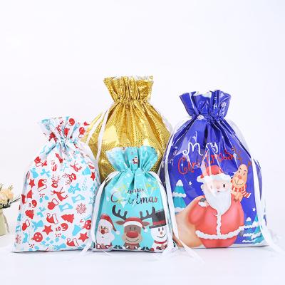 China BIODEGRADABLE wholesale plastic candy bag with drawstring snack bag for Christmas party kids kids gift bag for sale