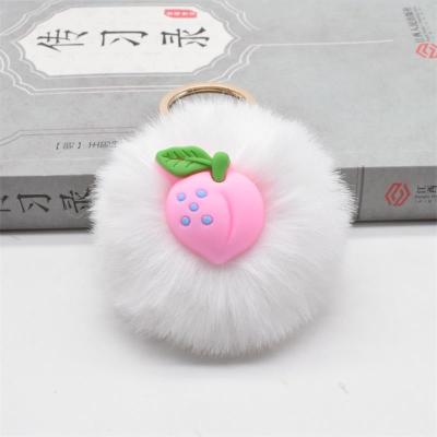 China New Lovely Avocado Peach Industry Fruit Car Mobile Phone Bag Gift Decor Key Chain Pendant Instruments Avocado Wool Ball for sale