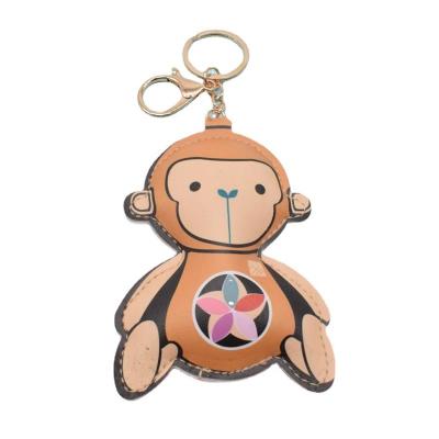 China Promotion Gift PU Cute Gold Monkey Clothing Boxcar Key Chain Accessories Wholesale Key Chain Pendant Gifts for sale