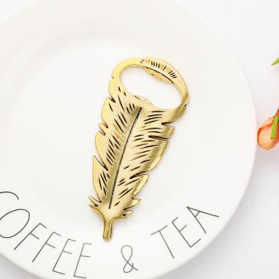 China Feather Gold Beer Bottle Opener Wedding Gift Alloy Gift Beer Bottle Opener Creative Viable Household Bottle Opener for sale