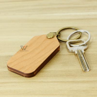 China Gift Wooden Key Chain Blank Carved Pattern Custom LOGO Wooden Keychain for sale