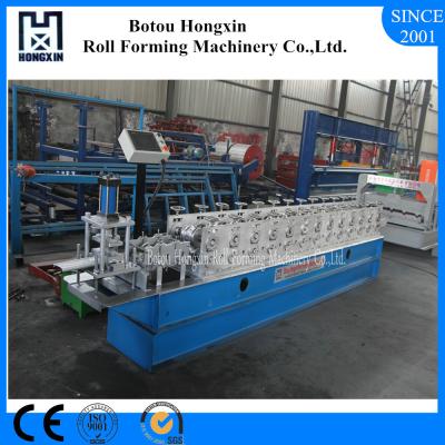 China 40mm Shafts Roller Shutter Door Roll Forming Machine With Embossing for sale