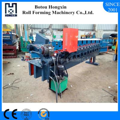 China Door Frame Shutter Door Roll Forming Machine Cr12 Cutting Blade 40mm Shaft for sale